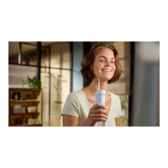 Philips Oral Irrigator | HX3333/24 Compact Flosser 1000 | 200 ml | Number of heads 1 | Blue Philips Oral Irrigator | HX3333/24 Compact Flosser 1000 | 200 ml | Number of heads 1 | Blue